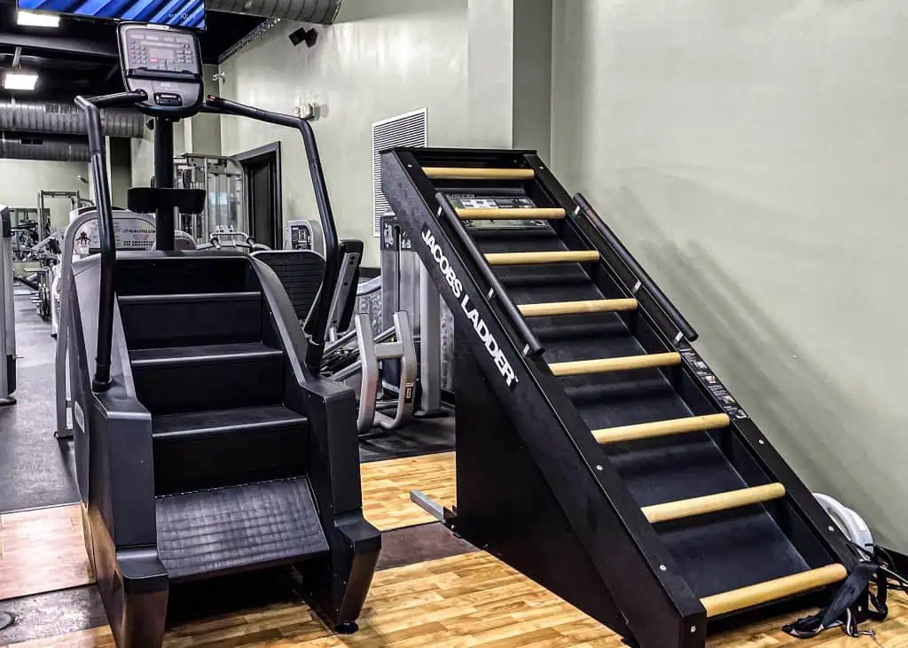 Jacobs Ladder and stair stepper cardio machines at Triangle Fitness.