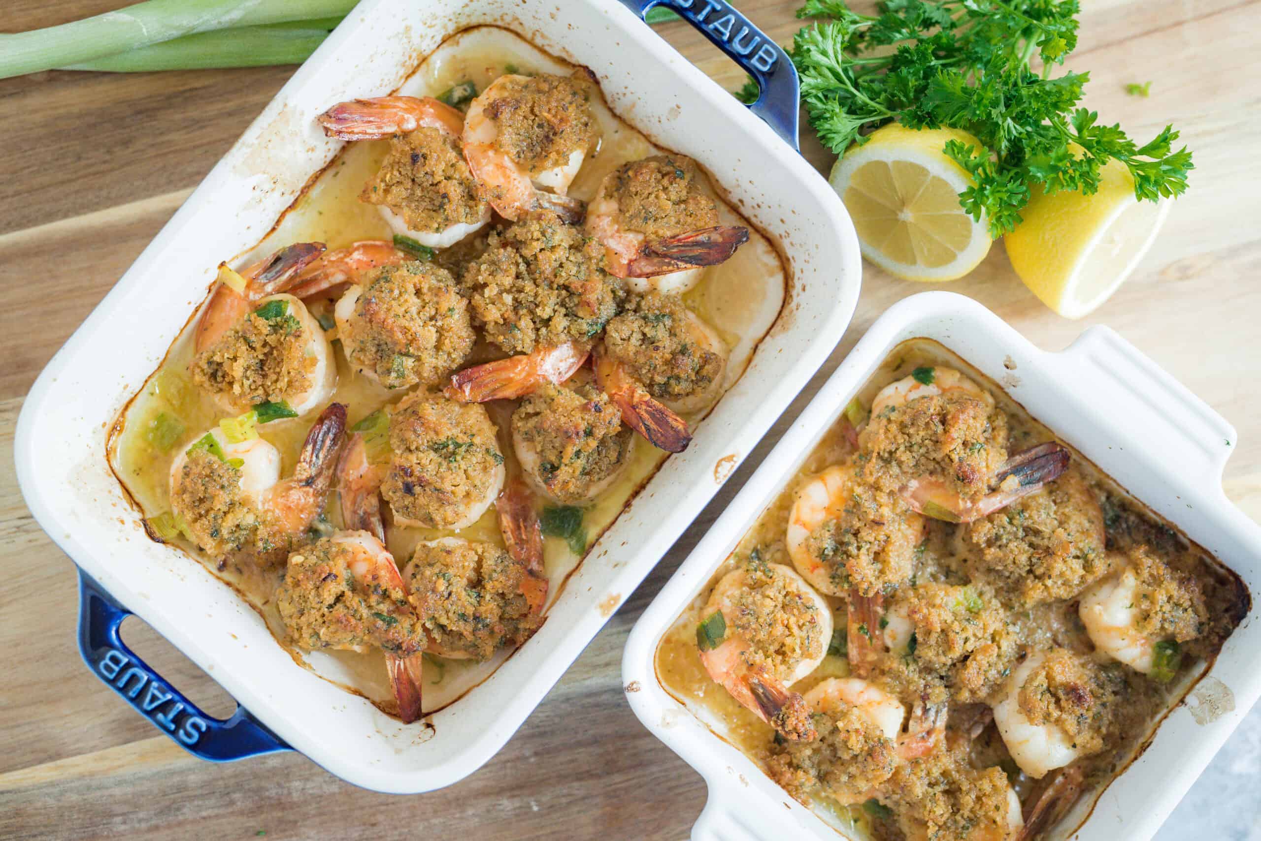 Succulent shrimp and scallops baked with crunchy breadcrumb topping in a creamy sauce, garnished with fresh herbs, lemon wedges, ideal for seafood lovers and easy dinner recipes.