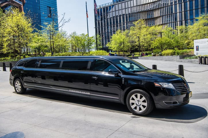 limousine luxury car black color, side view. Lincoln MKT lime car. Black luxury Lincoln MKT on the road.