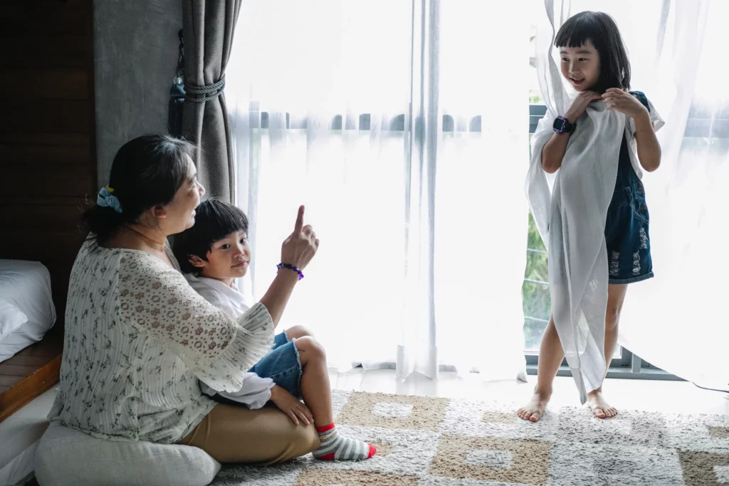 asian woman spending time with kids