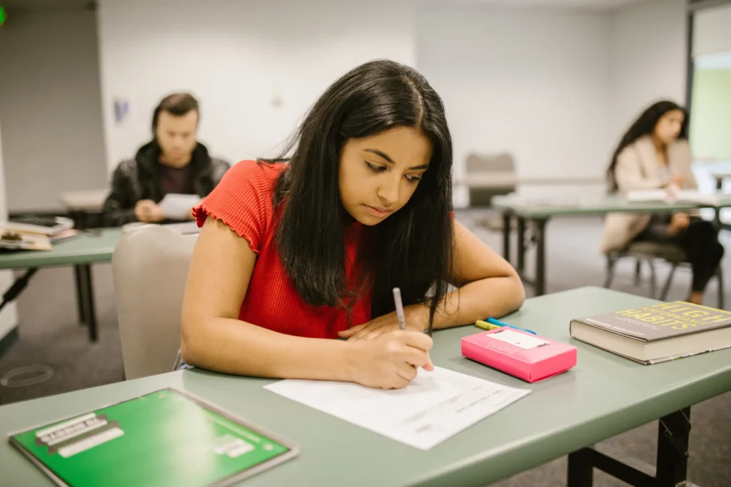 a student taking her exams with confidence