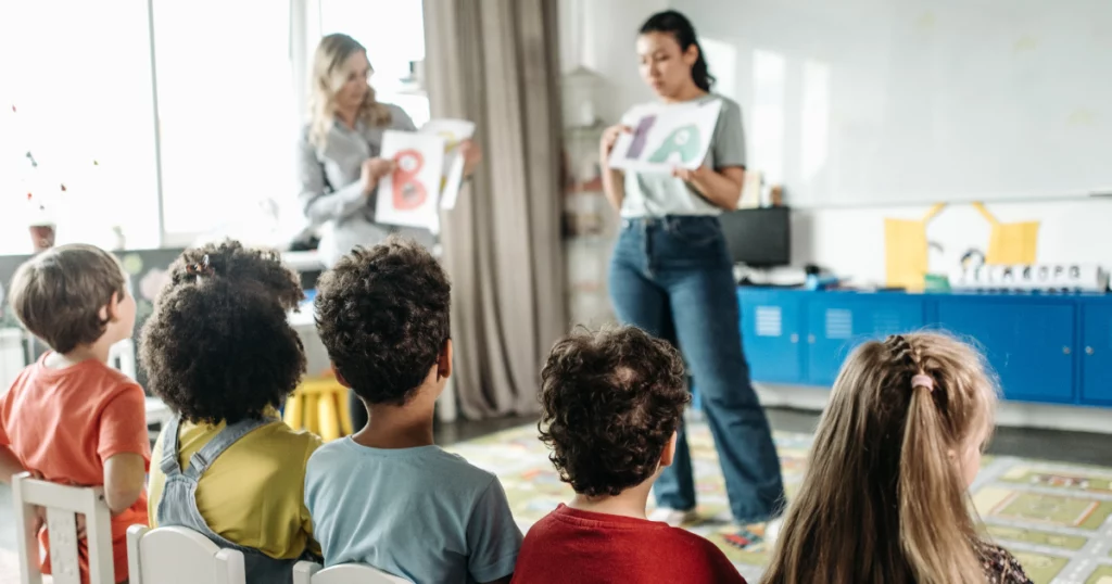 group tuition with two female teachers and six primary school students