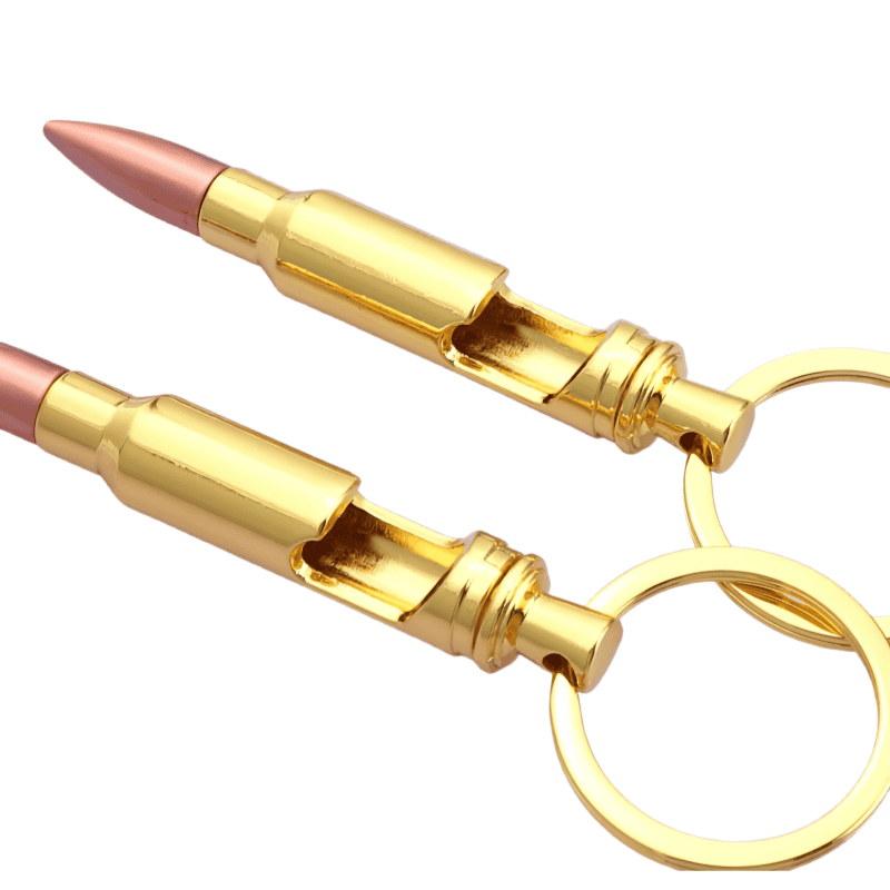 Close up view of built-in opener lever notch on brass bullet keychain