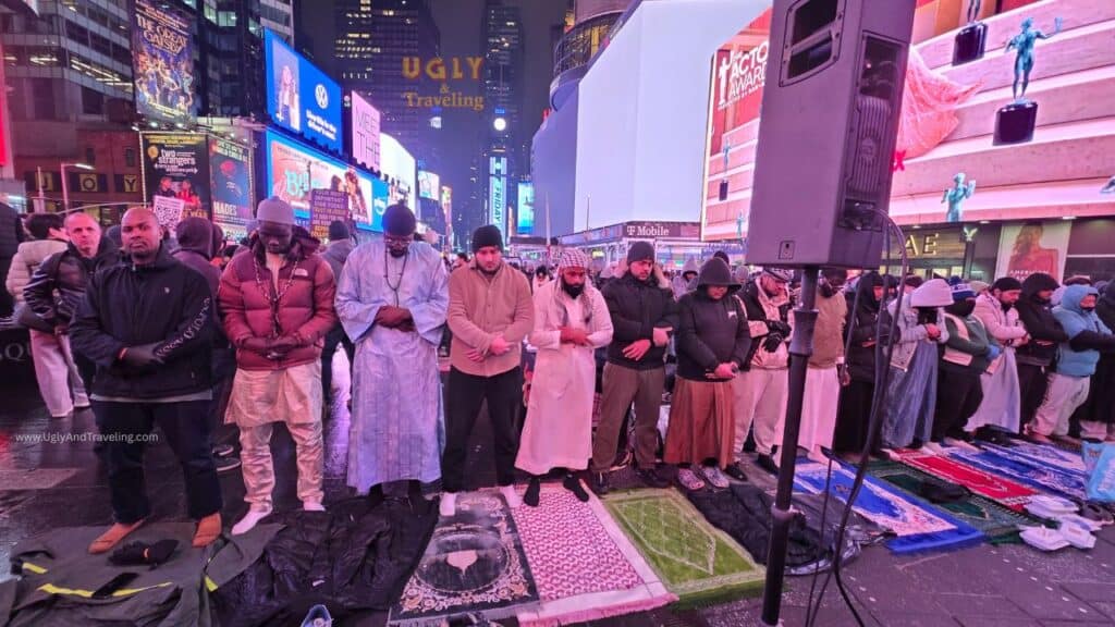 Muslims praying Taraweeh in Times Square during Ramadan celebration.