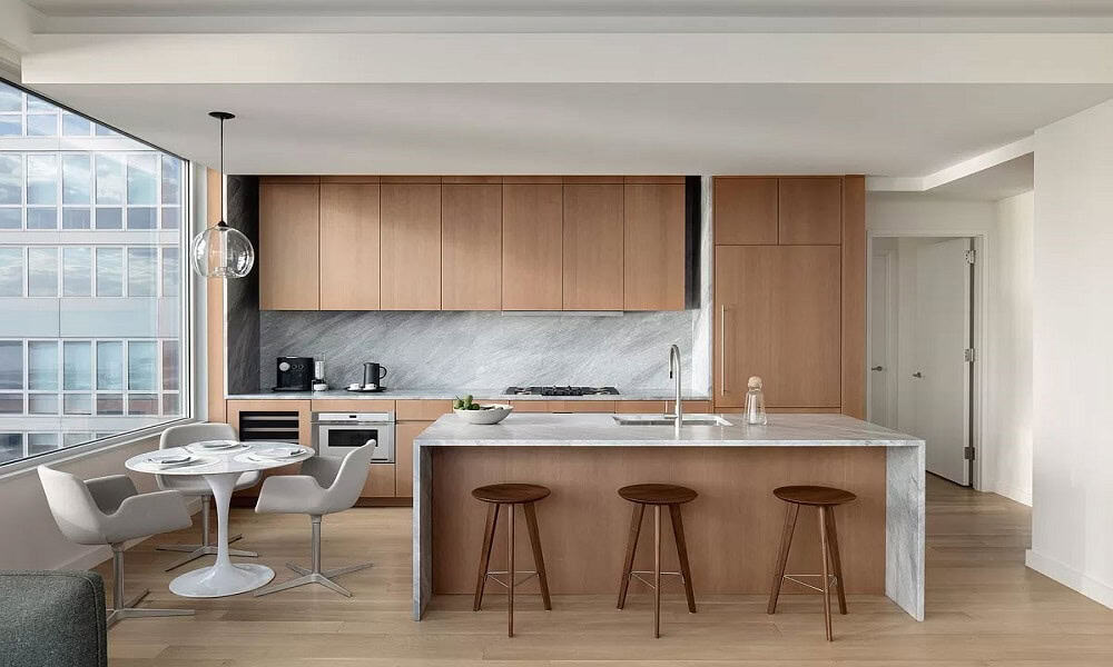 Contemporary urban kitchen with minimalist design and natural light.
