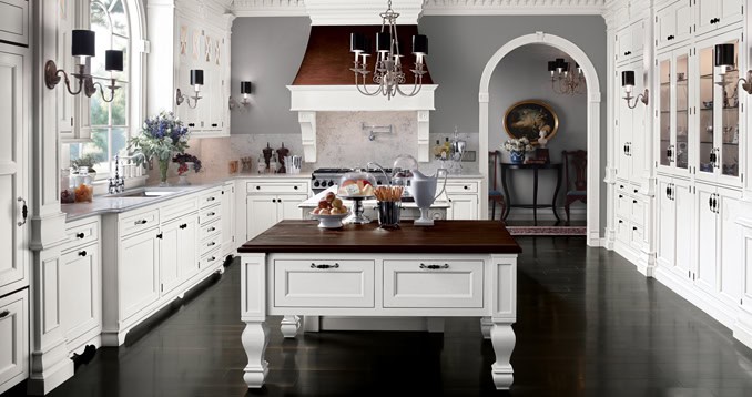 Elegant white Wood Mode kitchen with classic cabinetry, large windows, and a central island for cooking and di.