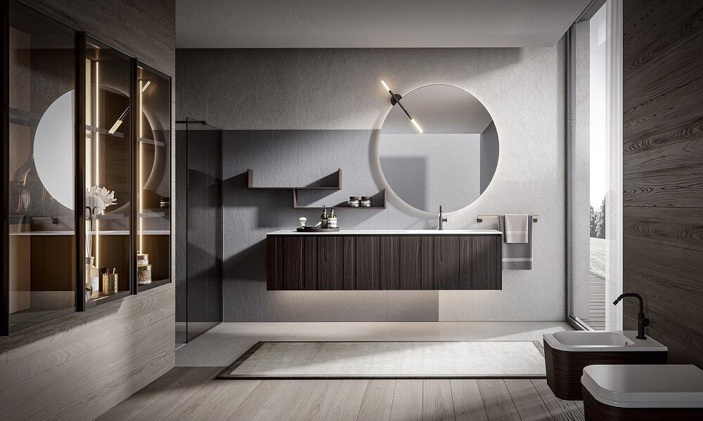 Elegant modern bathroom featuring a floating vanity, round mirror, and contemporary fixtures.