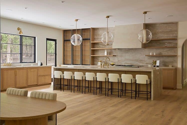Urban Homes modern kitchen with open-concept design and natural light.