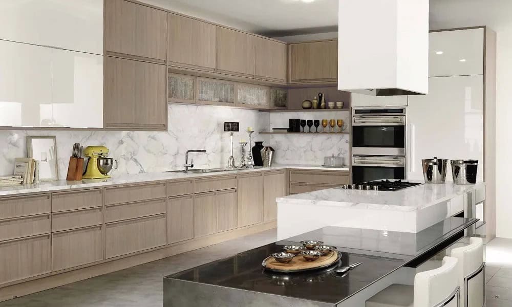 Contemporary kitchen with sleek, light wood cabinets and modern appliances.