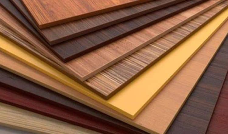 Wooden kitchen cabinet samples in various finishes and colors.