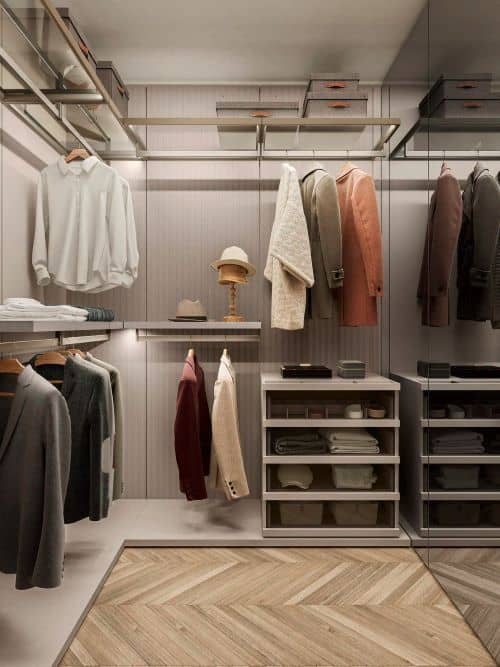 Efficient walk-in closet organizer with hanging space, shelves, and drawers for stylish storage.