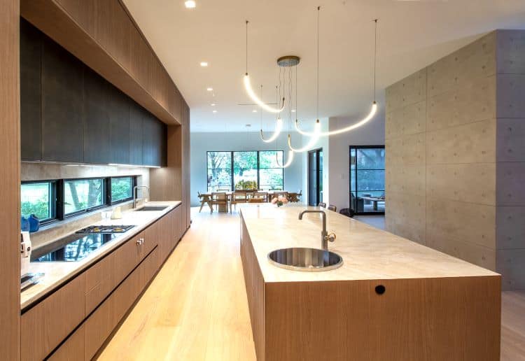 Elegant modern kitchen with custom cabinetry and sleek countertops in Cresskill, NJ. Perfect for con.