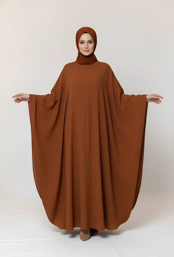 ABAY-001: Elegant modest brown abaya with flowing fabric and full coverage.