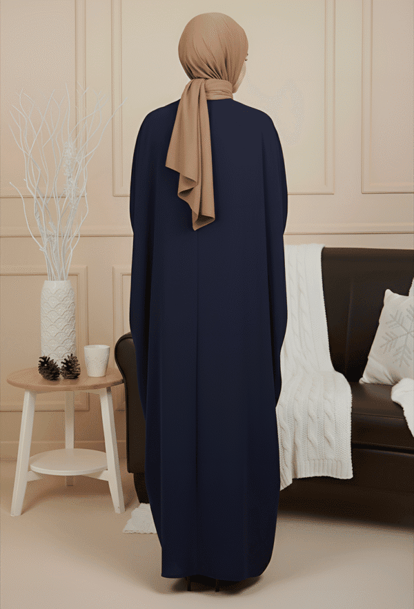 Navy blue abaya with beige hijab, modest Islamic fashion for women, elegant and stylish wear.