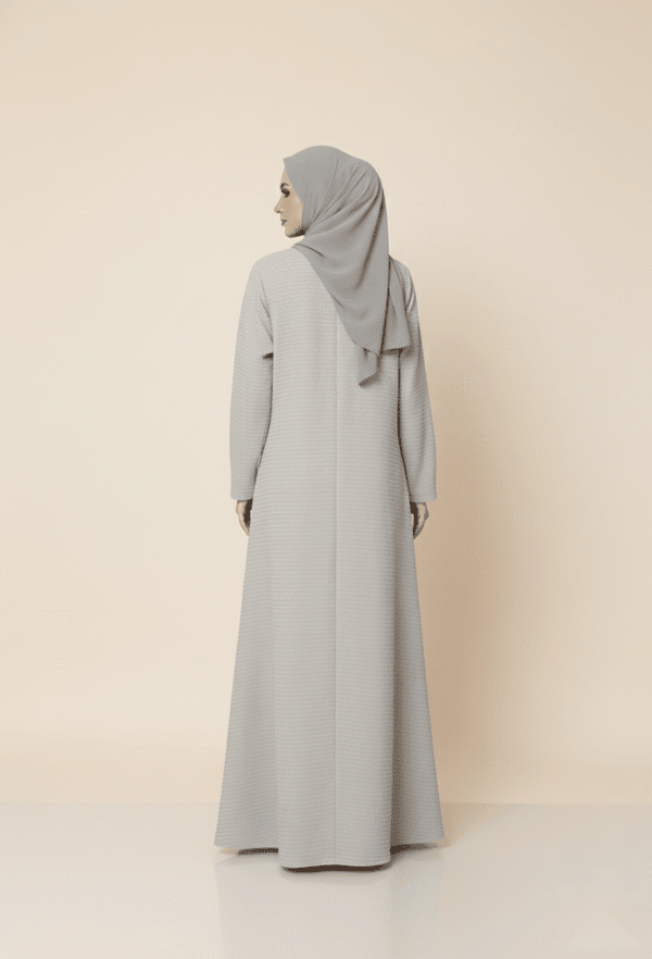 Elegant modest grey abaya with a matching hijab, perfect for contemporary Islamic fashion.