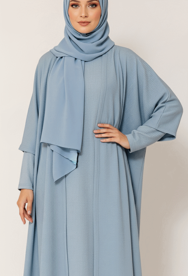 Elegant blue abaya with matching hijab, modest and stylish for women.