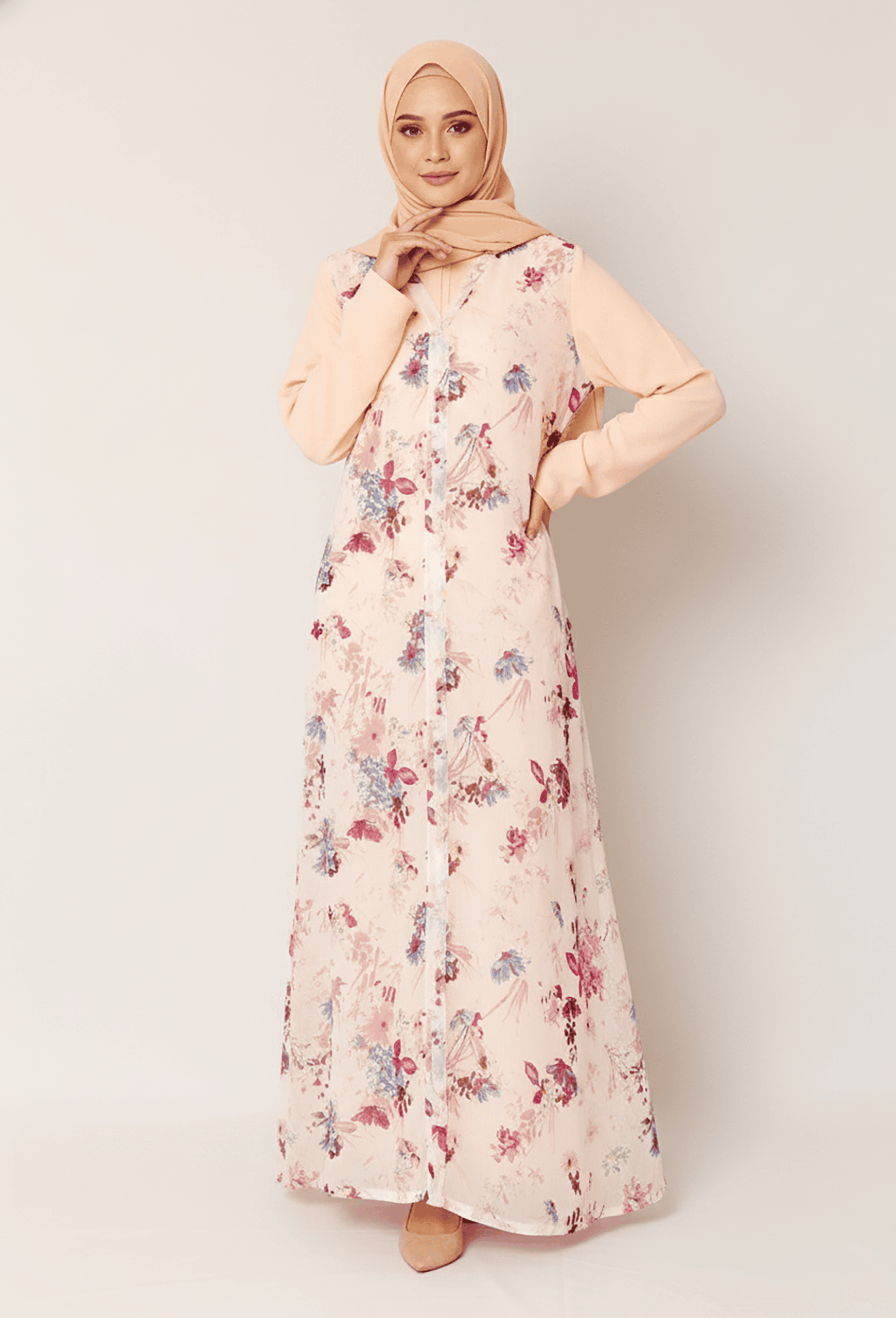 Elegant floral modest dress with hijab, perfect for special occasions and cultural events.