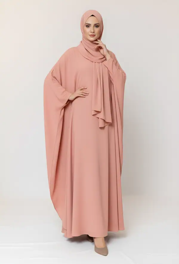 Elegant pink modest abaya with matching hijab for women, stylish and comfortable.