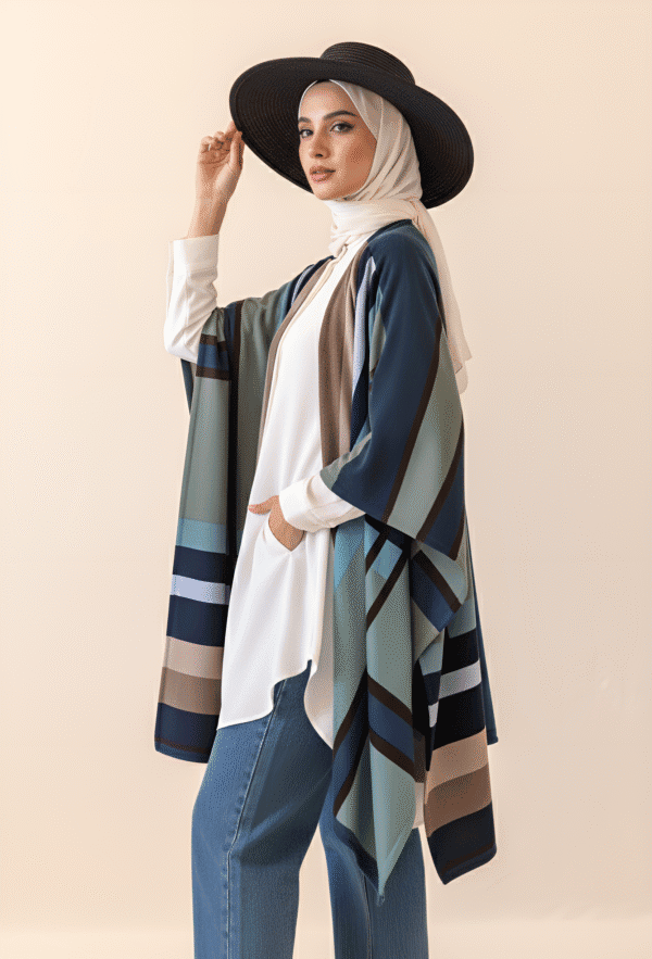Elegant woman wearing a stylish wide-brim hat, hijab, and fashionable layered outfit for summer or c.