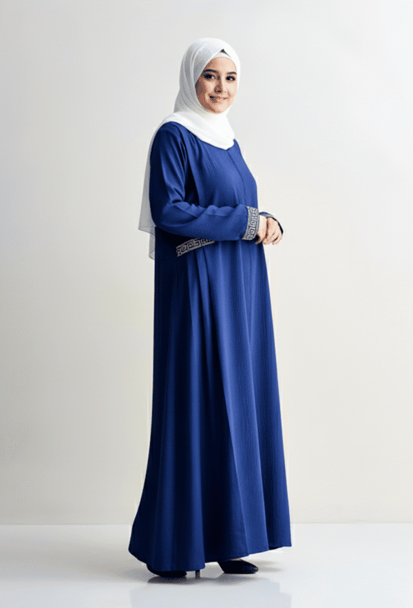 Elegant blue modest dress with white hijab, perfect for special occasions and cultural events.