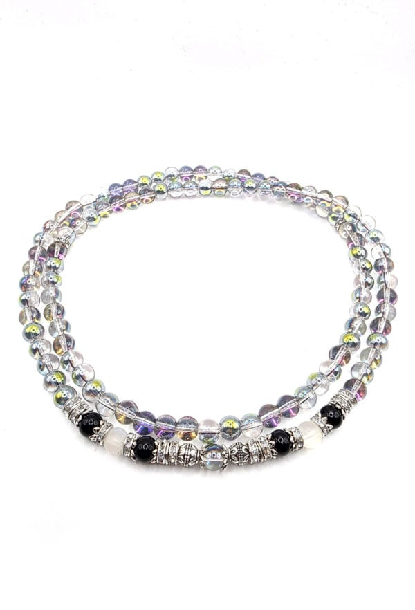 Elegant beaded necklace featuring silver, black, and iridescent beads for a stylish accessory.