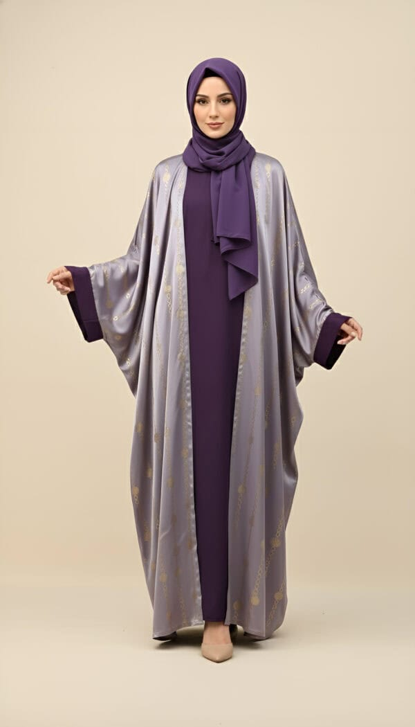 Elegant purple abaya with silver embroidery, styled with a matching hijab for a sophisticated look.