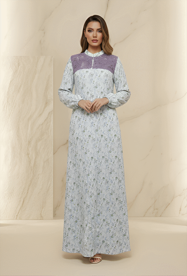 Elegant long dress with intricate floral patterns and purple accents, perfect for special occasions.