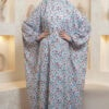 Elegant floral abaya with intricate patterns and modest design.