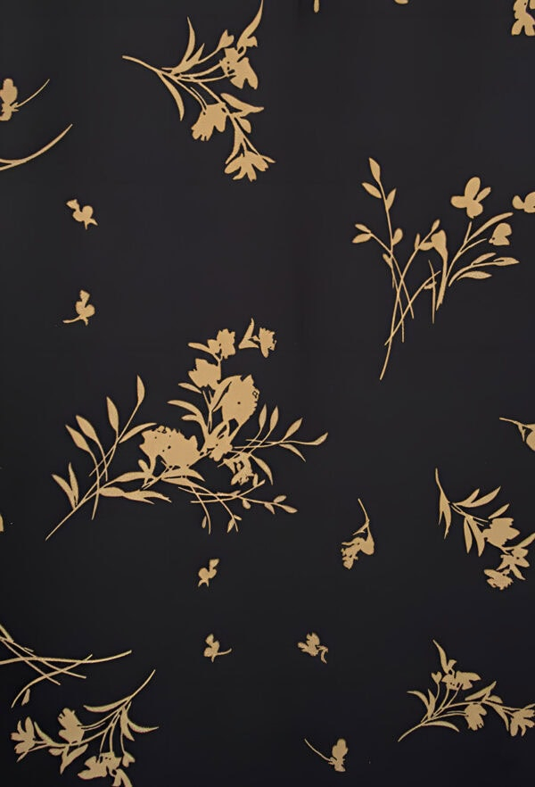 Elegant floral pattern with gold accents on a black background.