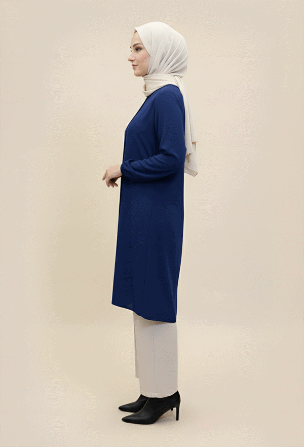 Elegant modest blue dress with a beige hijab, perfect for contemporary fashion.