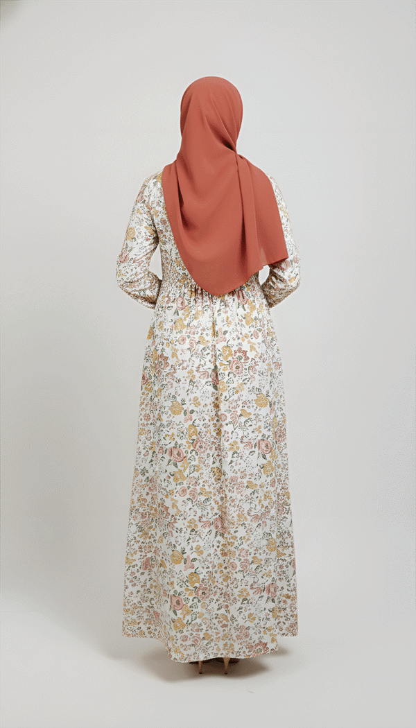 Elegant floral maxi dress paired with a rust-colored hijab for modest fashion.