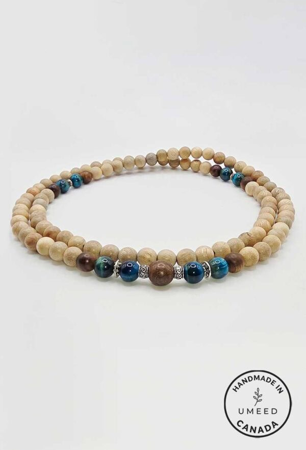 Elegant Beaded Wooden Necklace with Blue Accents.