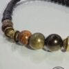 Handmade beaded necklace with black, brown, and gold beads, crafted in Canada by Umeed Designs.