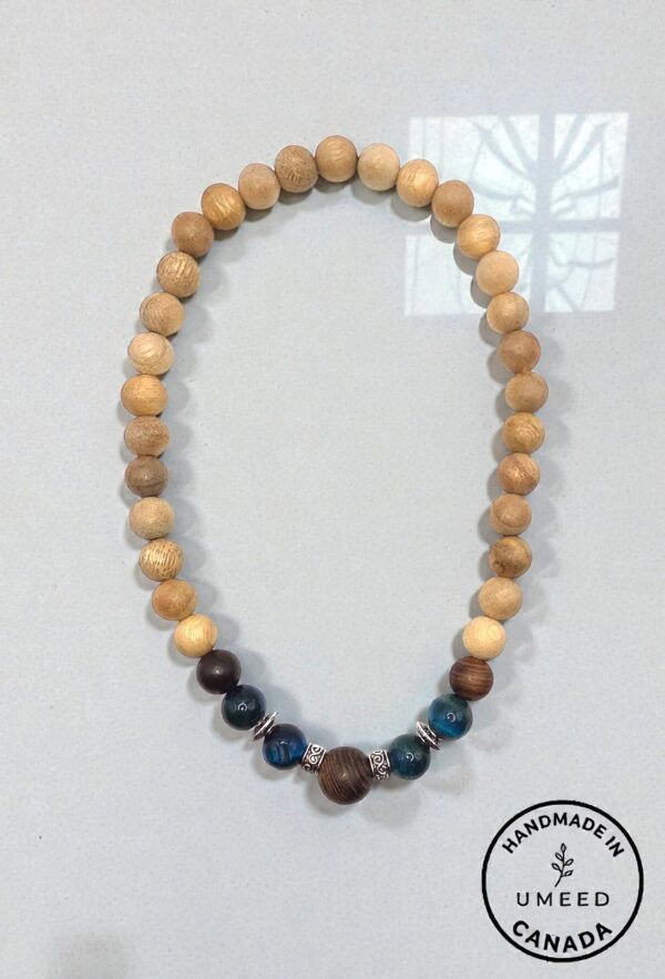 Beaded wooden necklace with natural and dyed beads, handmade jewelry from Umeed Designs.
