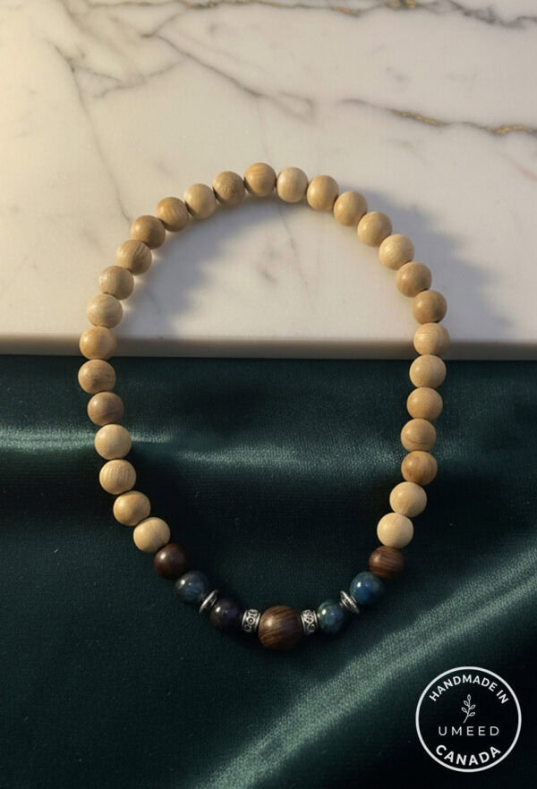 Beaded wooden necklace with natural and dark brown tones, handcrafted jewelry from Umeed Designs.