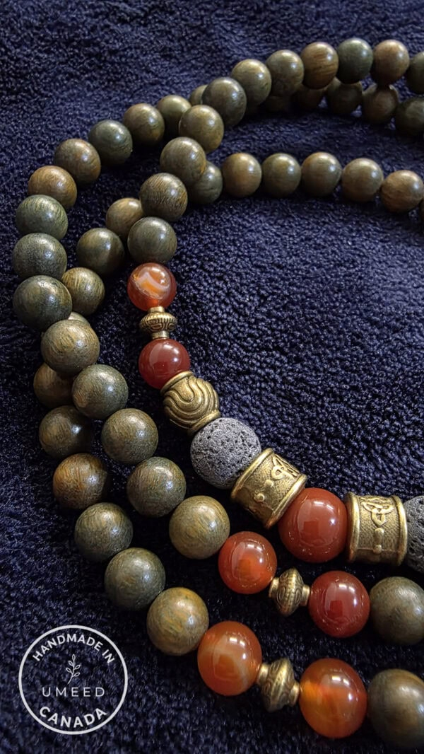 Elegant handmade beaded necklace with natural stones and brass accents. Perfect for stylish accessor.