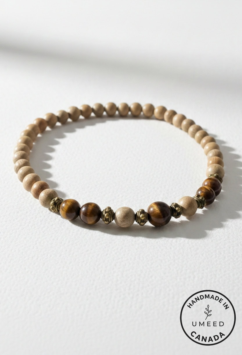 Beaded jewelry necklace featuring natural wood and metallic beads, handcrafted by Umeed Designs in C.