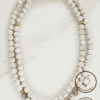 Pearl necklace featuring white pearls and gold accents, handmade by Umeed Designs in Canada.