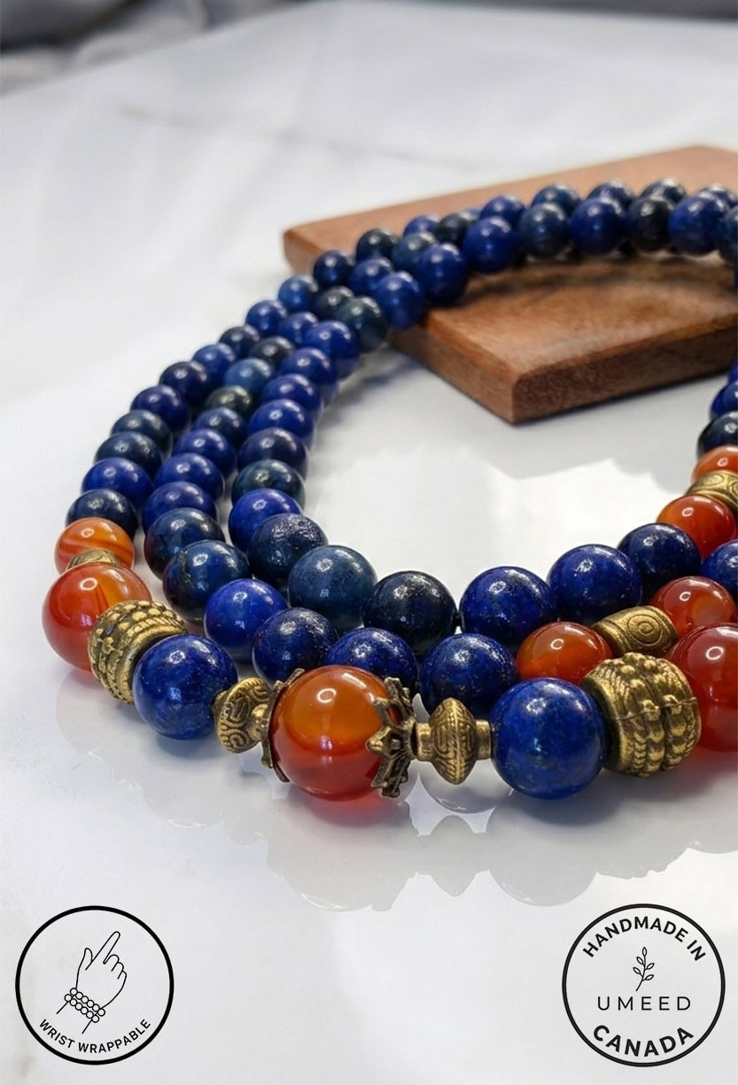 Handmade blue and orange beaded necklace with gold accents, crafted in Canada.