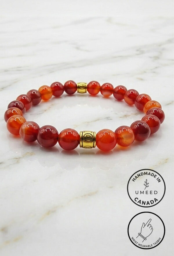 Red and gold beaded bracelet with handcrafted design, made in Canada by Umeed Designs.