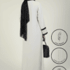 Lightweight abaya with hidden zip pockets, front open design, and elegant black and white pattern. P.