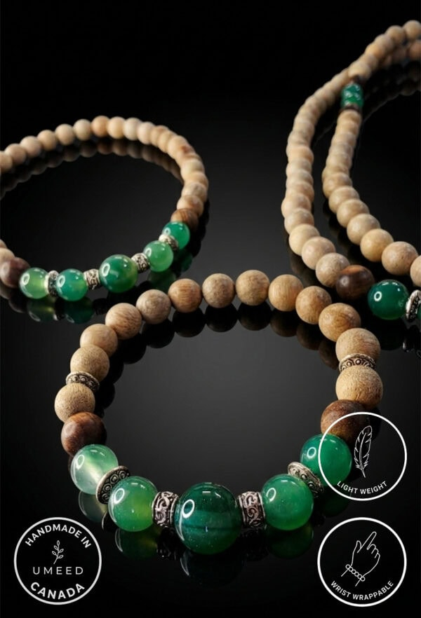 Green beaded necklace with silver accents, handcrafted jewelry from Umeed Designs.