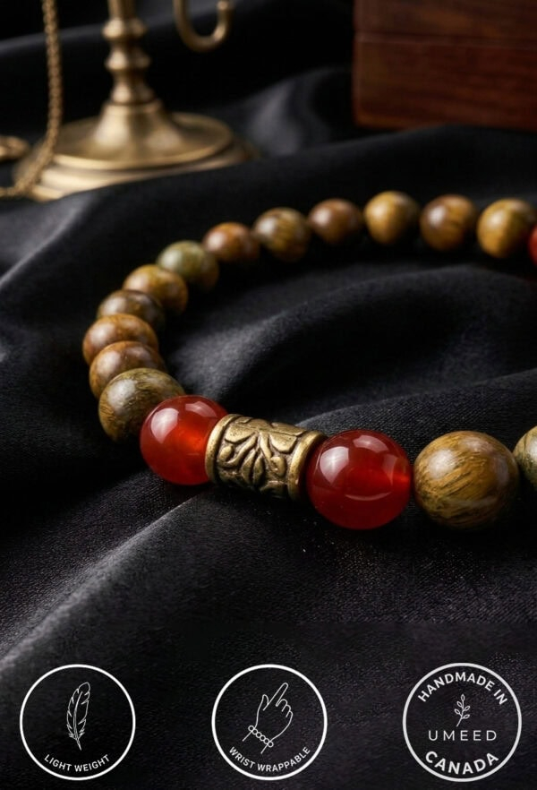 Beaded necklace featuring natural wood and red gemstone beads, handcrafted in Canada.