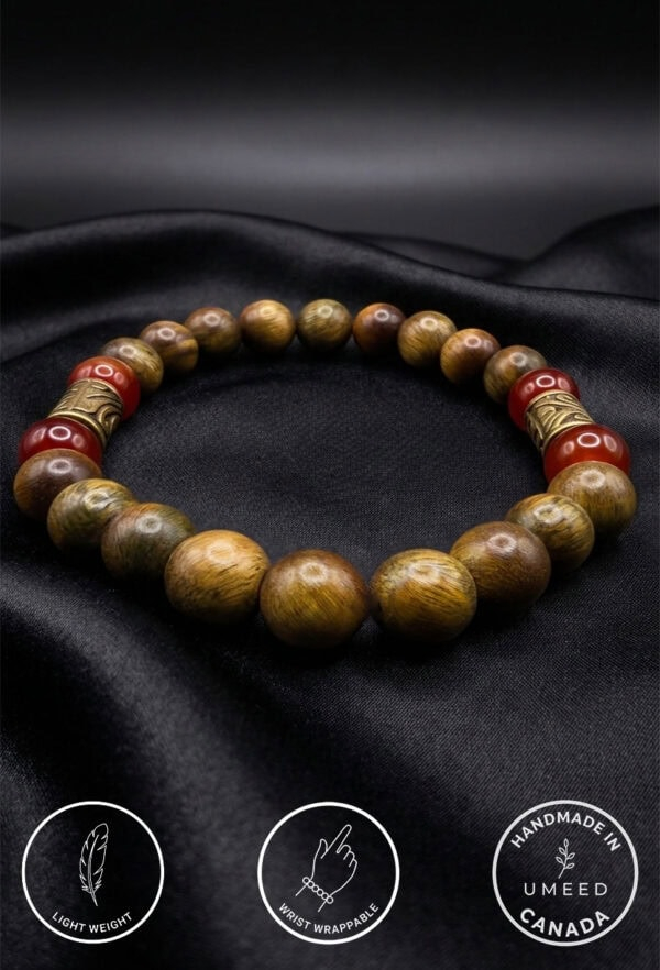 Bracelet with natural wooden beads and red accents, handcrafted in Canada by Umeed Designs.