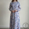 Elegant floral maxi dress in soft blue with pink and white flowers, perfect for casual or special oc.
