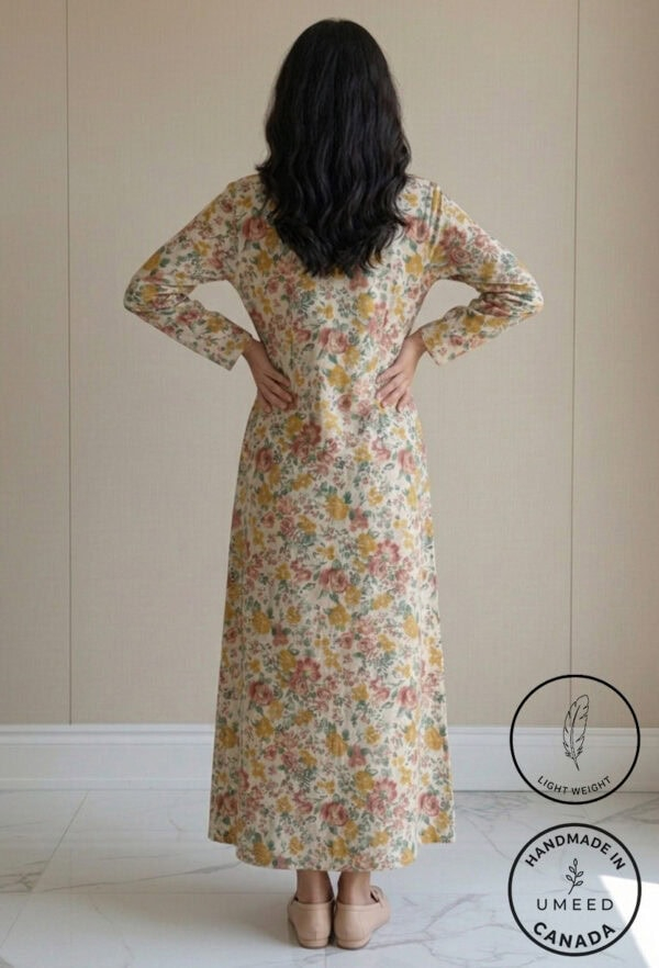 Elegant floral maxi dress with long sleeves, perfect for casual or special occasions. Handcrafted in.