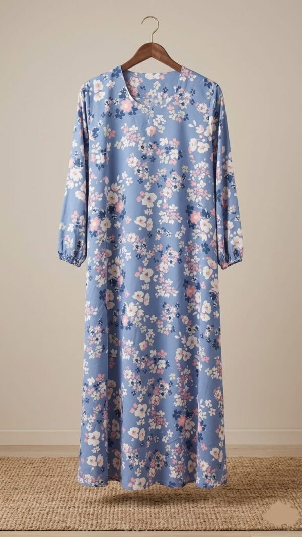 Floral maxi dress with blue background and pink, white, and purple flowers, perfect for summer or ca.