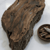 Rustic wooden decor with cinnamon sticks for a cozy, natural aesthetic.