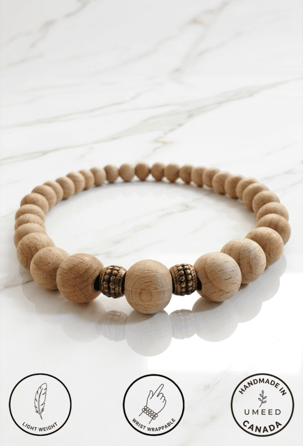Beaded wooden bracelet with adjustable wrap design, handmade in Canada. Perfect for casual or elegan.