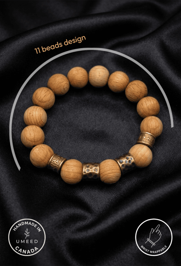Handmade wooden bead bracelet with 11 beads, crafted in Canada by Umeed Designs.